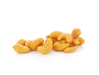 Roasted cashew nuts whith salt on white background
