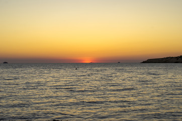 Beautiful sunset in Cala conta in Ibiza.