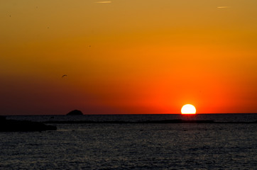 Beautiful sunset in Cala conta in Ibiza.