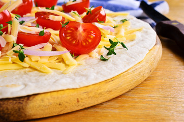 Flat tortilla with cheese and vegetables