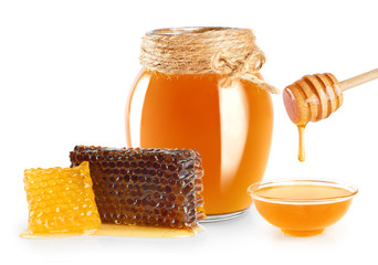 Fresh honey with honeycomb isolated on white background.
