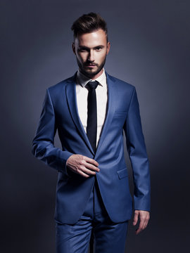 Handsome stylish man in blue suit