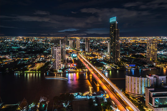 View of Chaophraya river at night time, Bangkok, Thailand 