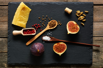 Fototapeta na wymiar Spices, cheese and figs