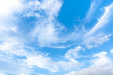 Naklejka na ściany i meble White clouds on the blue sky. Sky texture