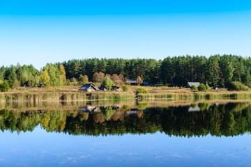 Colorful landscape with a abandoned village on the shore of fore
