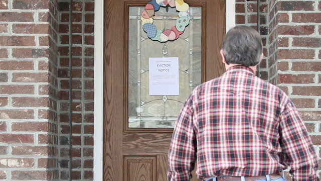 Eviction notice on door of home owner P HD 8869