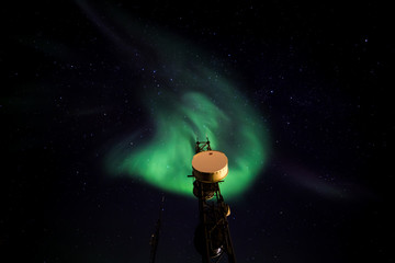 Naklejka premium Greenlandic northern lights over Nuuk