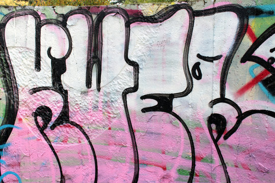 Street Art Graffiti spray painted on wall