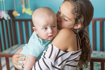Cute newborn baby with his sister