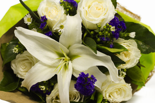 beautiful bouquet of white rose, white chrysanthemum and purple statice