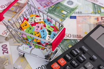 Shopping cart with question marks and euro banknotes with calcul