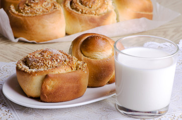 homemade buns with a glass of milk