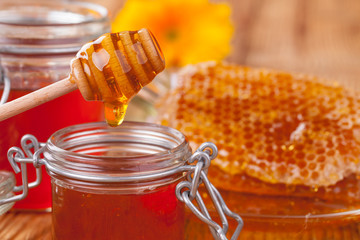 Fresh honey with dipper