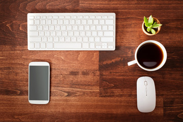 Neat workstation on a wooden desk