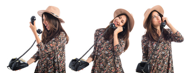 Woman talking to vintage phone