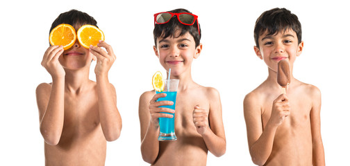 Child holding a blue drink