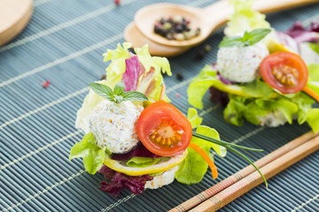 Healthy Rice Canape with Protein Cheese and Cherry Tomato, Sesame, Green Lettuce, Lemon, Purple Cabbage, Pepper