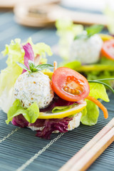 Healthy Rice Canape with Protein Cheese and Cherry Tomato, Sesame, Green Lettuce, Lemon, Purple Cabbage, Pepper