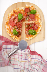 spicy meat pizza with basil