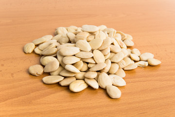 Almonds on wooden stand