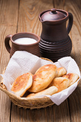 Homemade pies with curd and milk