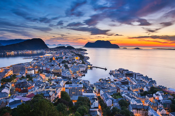 Top view of the city of Alesund at sunset . Norway