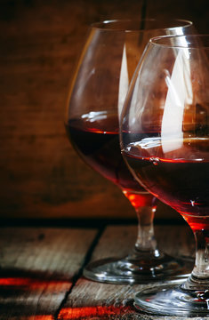 Two glasses of cognac, selective focus