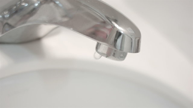 Tap bathroom sink dripping water waste HD 004
