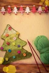 Knitted Christmas tree on paper
