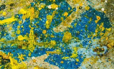 colorful paint drops on the floor abstract background unfocused