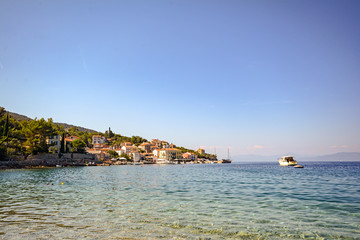 Naklejka premium Cres Island, Croatia: View to a hidden bay near village Valun in the evening sun