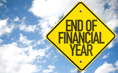 End of Financial Year sign with sky background