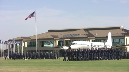 Lackland AFB HQ and Airmen marching HD