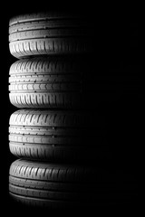 Fototapeta na wymiar Tyres in dramatic lighting