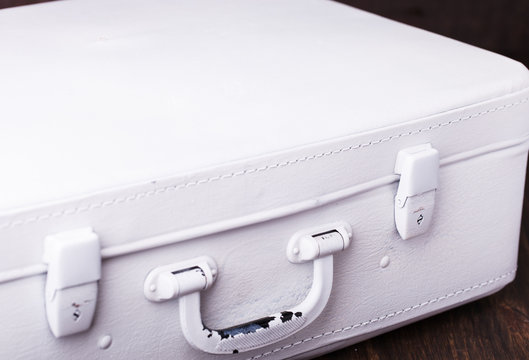Vintage suitcase painted white paint