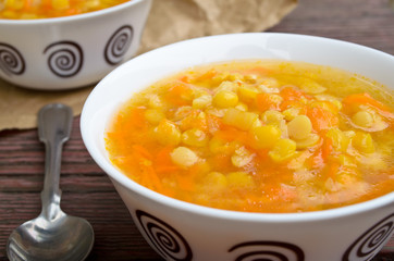 Yellow pea soup with vegetables and oil