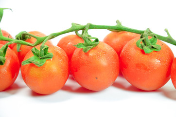 Red tomato isolated on white background