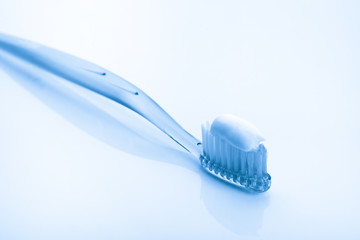 tooth brush in glass Isolated on white background..
