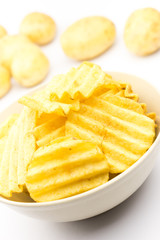 Potato chips on white background..