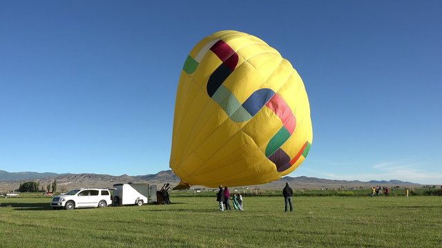 Yellow hot air balloon ready for flight 4K 046