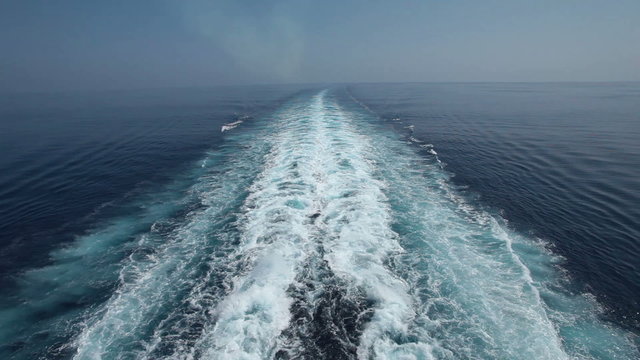 Ocean wake smoke behind large ship P HD 1288