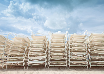 Stack of beach lounge chairs