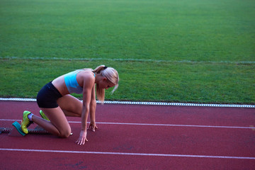 pixelated design of woman  sprinter leaving starting blocks