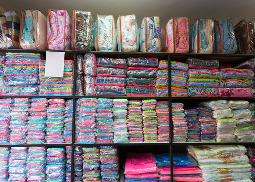 warehouse of towel softness fluffy fiber fabric on shelf