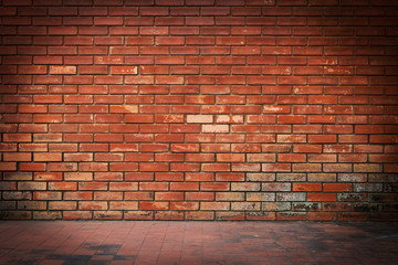 old brick wall weathered texture and dirty floor background
