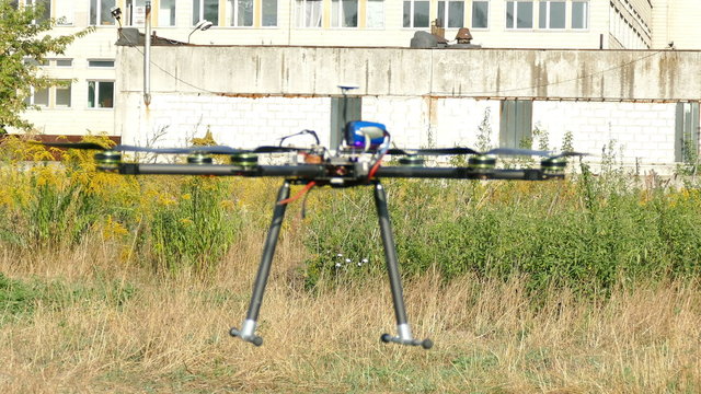 
Drone flies in air  against building .4K 3840x2160

