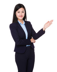 Businesswoman showing open hand palm