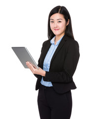 Asian businesswoman use of the tablet pc