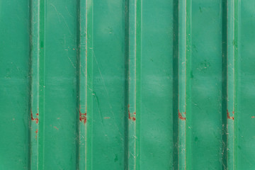 steel metallic old rusty door, green grunge metal background